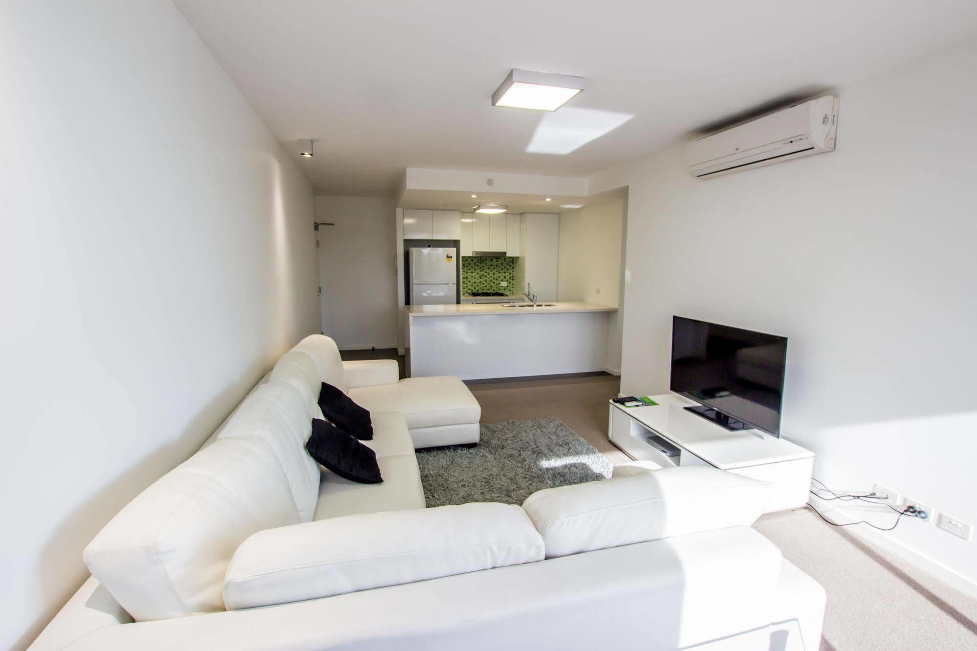 이스트우드 아파트 브리즈번 외부 사진 A living room in a modern apartment